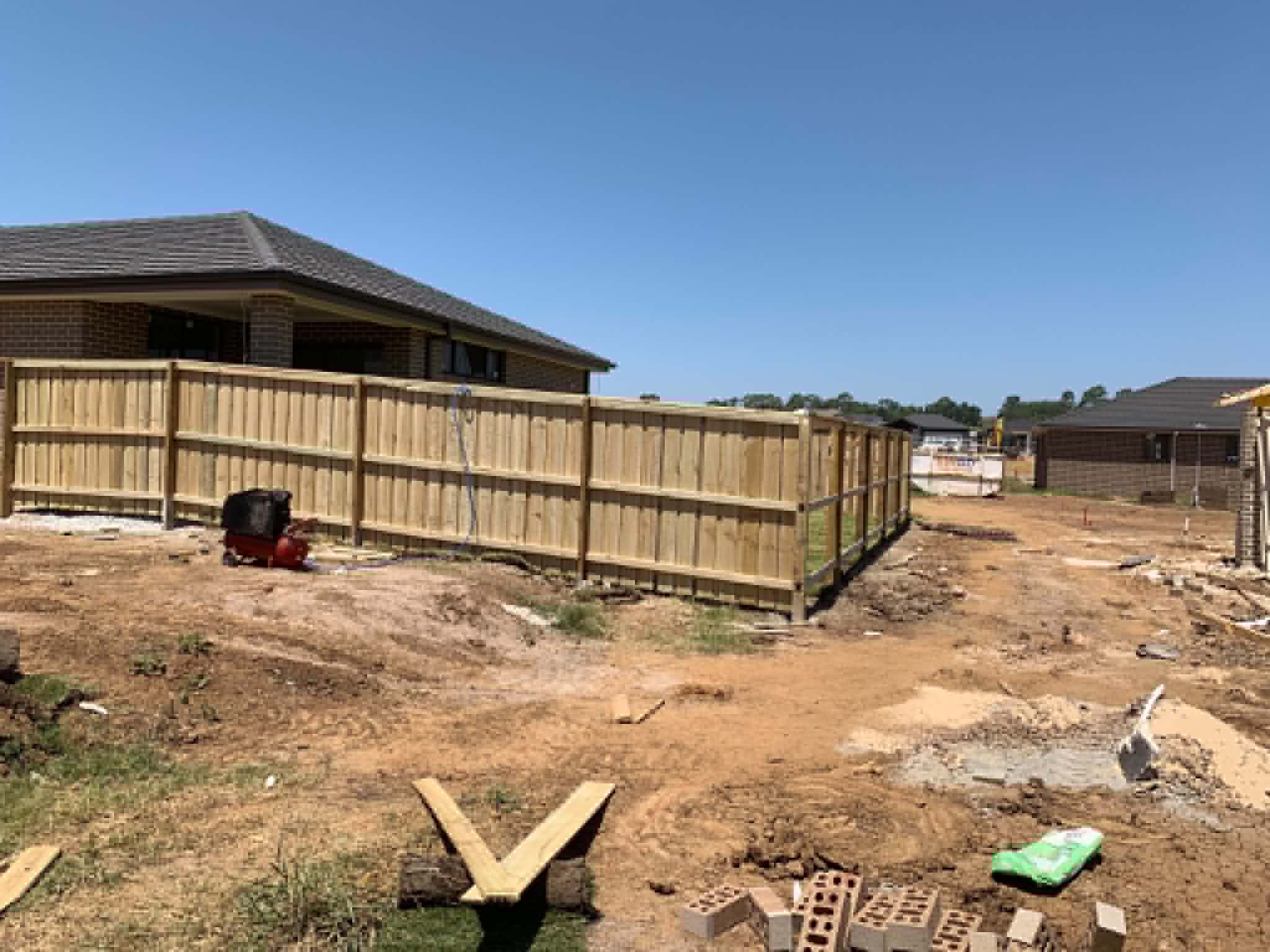 Under-Fence Sleeper Retaining in Penrith